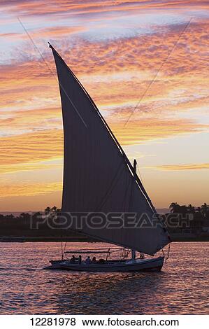 Felucca on the Nile River; Luxor, Egypt View Large Photo Image Stock Photo - Felucca on the Nile River; Luxor, Egypt. Fotosearch