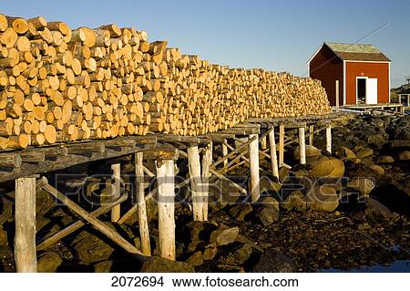 Firewood Stacked On Stage, Change Islands, Newfoundland & Labrador View Large Photo Image Picture - Firewood Stacked On Stage, Change Islands, Newfoundland & Labrador. Fotosearch