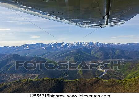 Stock Photograph - Flying in a small fixed-wing plane in the YukonCharley Rivers National Preserve, Alaska, United States of America. Fotosearch