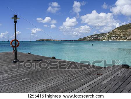 Stock Photograph - Harbour and boardwalk on Great Bay; Philipsburg, St Maarten. Fotosearch