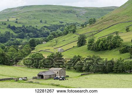 Stock Photo - Haytime in early summer; Swaledale, North Yorkshire, England. Fotosearch