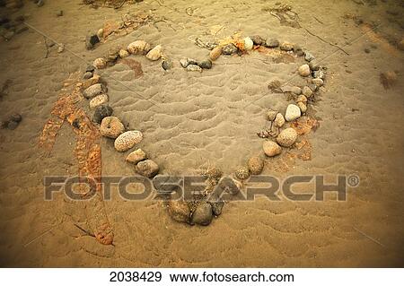 Stock Photo - Heart Shaped With Stones On Beach, Rathtrevor Provincial Park, Vancouver Island, Bc. Fotosearch