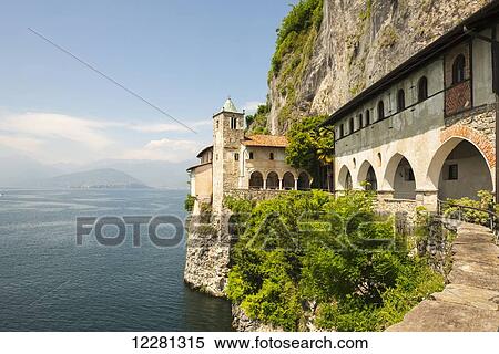 Stock Photography - Hermitage of Santa Caterina del Sasso, a roman catholic monastery; Leggiuno, Lombardy, Italy. Fotosearch