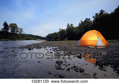 Illuminated tent on the Muskoka river; Bracebridge, Ontario, Canada View Large Photo Image Stock Image - Illuminated tent on the Muskoka river; Bracebridge, Ontario, Canada. Fotosearch