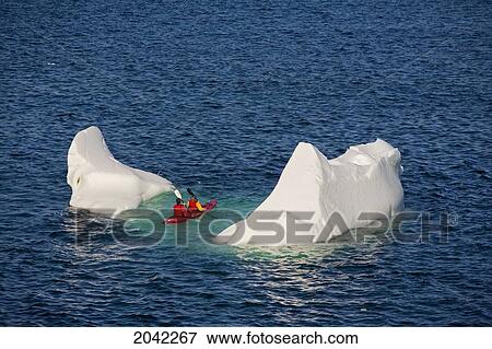 Kayakers Paddling Over Iceberg, Quirpon Island, Newfoundland & Labrador View Large Photo Image Stock Photo - Kayakers Paddling Over Iceberg, Quirpon Island, Newfoundland & Labrador. Fotosearch