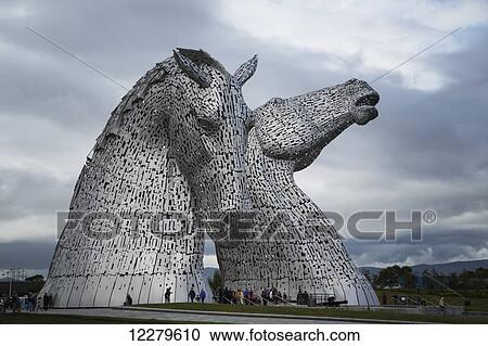 Kelpies under a cloudy sky; Falkirk, Scotland View Large Photo Image Stock Image - Kelpies under a cloudy sky; Falkirk, Scotland. Fotosearch
