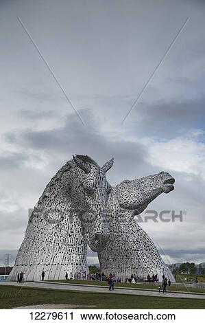 Kelpies under a cloudy sky; Falkirk, Scotland View Large Photo Image Stock Image - Kelpies under a cloudy sky; Falkirk, Scotland. Fotosearch