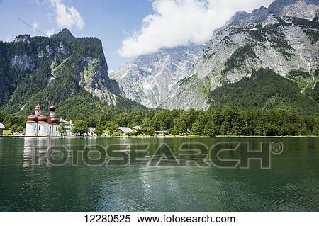 Stock Photography - Konigssee Lake, St. Bartholomew's church; Schonau am Konigsee, Bavaria, Germany. Fotosearch