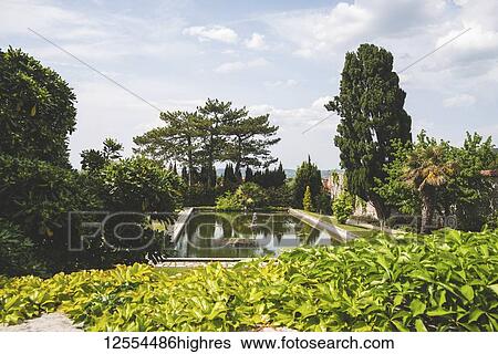 Stock Photograph - Landscaped grounds of Duino Castle; Italy. Fotosearch