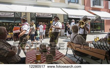 Local band walking in the street; Berchtesgaden, Bavaria, Germany View Large Photo Image Stock Photo - Local band walking in the street; Berchtesgaden, Bavaria, Germany. Fotosearch
