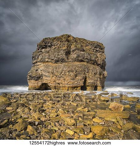 Marsden Rock, a 100 feet (30 metre) sea stack off the North East coast of England, situated at Marsden, South Shields; South Shields, Tyne and Wear, England View Large Photo Image Stock Photograph - Marsden Rock, a 100 feet (30 metre) sea stack off the North East coast of England, situated at Marsden, South Shields; South Shields, Tyne and Wear, England. Fotosearch