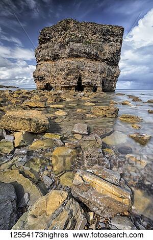 Marsden Rock, a 100 feet (30 metre) sea stack off the North East coast of England, situated at Marsden, South Shields; South Shields, Tyne and Wear, England View Large Photo Image Stock Photograph - Marsden Rock, a 100 feet (30 metre) sea stack off the North East coast of England, situated at Marsden, South Shields; South Shields, Tyne and Wear, England. Fotosearch