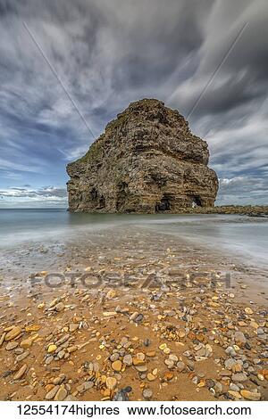 Stock Photograph - Marsden Rock, a 100 feet (30 metre) sea stack off the North East coast of England, situated at Marsden, South Shields; South Shields, Tyne and Wear, England. Fotosearch