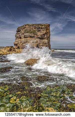 Stock Photograph - Marsden Rock, a 100 feet (30 metre) sea stack off the North East coast of England, situated at Marsden, South Shields; South Shields, Tyne and Wear, England. Fotosearch