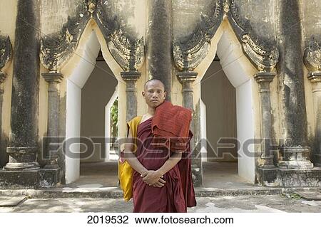 Monk Outside A Temple, Bagan, Myanmar (Burma) View Large Photo Image Stock Image - Monk Outside A Temple, Bagan, Myanmar (Burma). Fotosearch