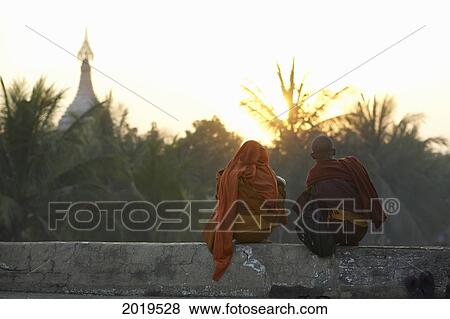 Stock Photo - Monks On Temple Wall, Bagan, Myanmar (Burma). Fotosearch