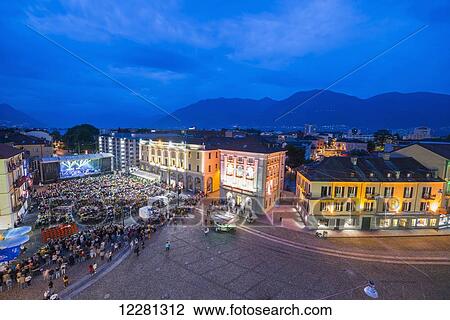 Music concert at dusk in Piazza grande; Locarno, Ticino, Switzerland View Large Photo Image Stock Image - Music concert at dusk in Piazza grande; Locarno, Ticino, Switzerland. Fotosearch
