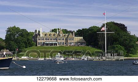 New York Yacht Club summer club house with people on the terrace, yachts anchored in front; Newport, Rhode Island, United States of America View Large Photo Image Stock Photo - New York Yacht Club summer club house with people on the terrace, yachts anchored in front; Newport, Rhode Island, United States of America. Fotosearch