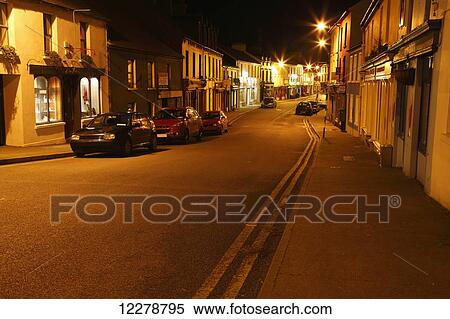 Night lights of Schull village on the Wild Atlantic Way in West Cork; County Cork, Ireland View Large Photo Image Stock Photography - Night lights of Schull village on the Wild Atlantic Way in West Cork; County Cork, Ireland. Fotosearch