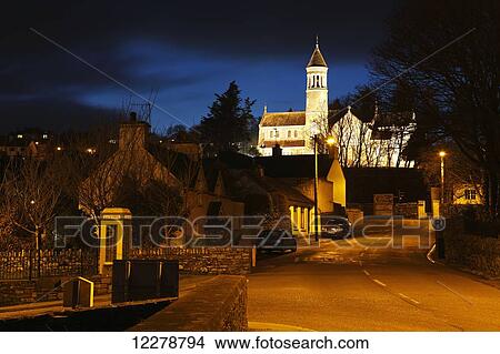Picture - Night lights of Timoleague village on the Wild Atlantic Way in West Cork; County Cork, Ireland. Fotosearch