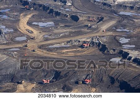 Oil Sands Mining Operations At Syncrude Canada's Aurora Mine Project, Fort Mcmurray, Alberta View Large Photo Image Stock Image - Oil Sands Mining Operations At Syncrude Canada's Aurora Mine Project, Fort Mcmurray, Alberta. Fotosearch