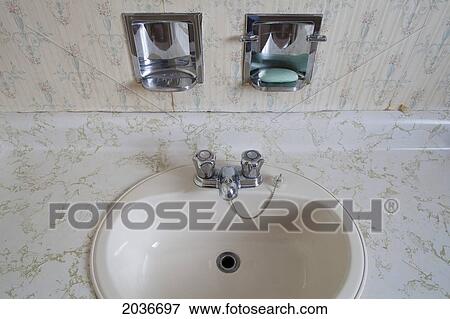 Stock Photo - Old Bathroom Sink With A Green Bar Of Soap. Fotosearch