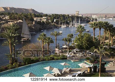Picture - Old Cataract Hotel swimming pool on the Nile River; Aswan, Egypt. Fotosearch