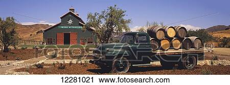 Old pick up truck loaded with wine casks sits in front of a wine tasting room in the Santa Ynez Valley; Lompoc, California, United States of America View Large Photo Image Stock Image - Old pick up truck loaded with wine casks sits in front of a wine tasting room in the Santa Ynez Valley; Lompoc, California, United States of America. Fotosearch
