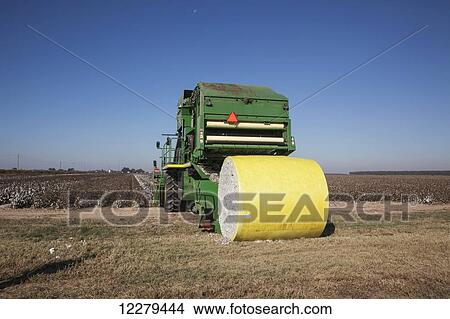Picture - Onboard module building cotton picker; England, Arkansas, United States of America. Fotosearch