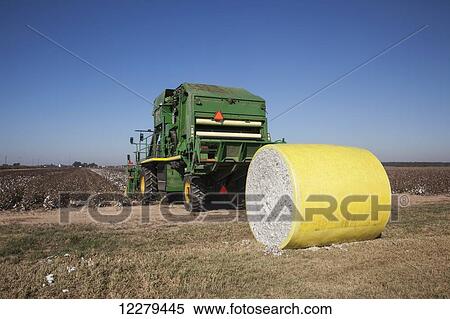 Stock Photography - Onboard module building cotton picker; England, Arkansas, United States of America. Fotosearch