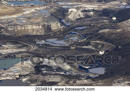 Operations At The Muskeg River Mine Part Of The Albian Sands Oil Sands Project Near Fort Mcmurray, Alberta View Large Photo Image Picture - Operations At The Muskeg River Mine Part Of The Albian Sands Oil Sands Project Near Fort Mcmurray, Alberta. Fotosearch