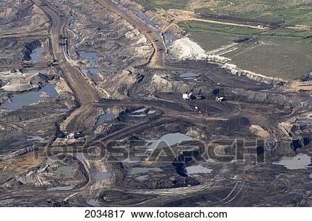 Operations At The Muskeg River Mine Part Of The Albian Sands Oil Sands Project Near Fort Mcmurray, Alberta View Large Photo Image Stock Photo - Operations At The Muskeg River Mine Part Of The Albian Sands Oil Sands Project Near Fort Mcmurray, Alberta. Fotosearch