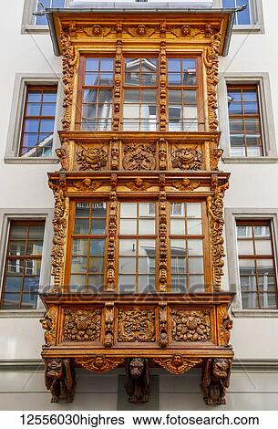 Stock Photograph - Ornate facade of window frames on a building exterior; St. Gallen, St. Gallen, Switzerland. Fotosearch