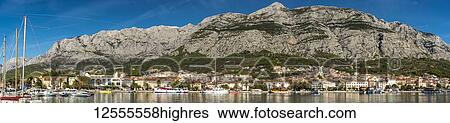 Stock Photograph - Panoramic view of Makarska's harbour, Makarska Riviera; Makarska, Dalmatia, Croatia. Fotosearch