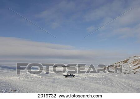 Stock Image - Pickup Truck At The End Of The Ice Road, Cambridge Bay, Nunavut. Fotosearch