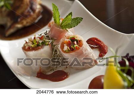 Plated Veggie Wraps On Curved White Plates, Selective Focus View Large Photo Image Stock Photograph - Plated Veggie Wraps On Curved White Plates, Selective Focus. Fotosearch