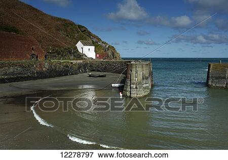 Porthgain beach and village on the Pembrokeshire coastal path in Southwest Wales; Wales View Large Photo Image Stock Photo - Porthgain beach and village on the Pembrokeshire coastal path in Southwest Wales; Wales. Fotosearch