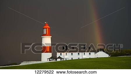 Rainbow and a red and white lighthouse; South Shields, Tyne and Wear, England View Large Photo Image Stock Image - Rainbow and a red and white lighthouse; South Shields, Tyne and Wear, England. Fotosearch
