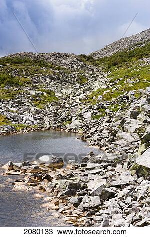 Stock Image - Rocks And Pond On Mont Jacques-Cartier In Gaspesie National Park; Quebec, Canada. Fotosearch