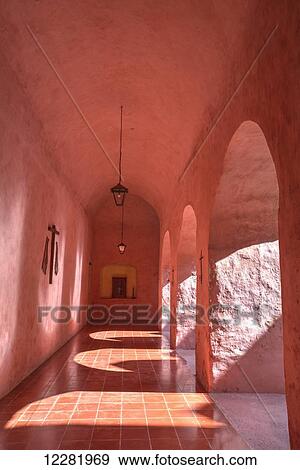 Stock Photo - Rose-coloured arches, Church of San Bernadino de Siena and Convent of Sisal, founded in 1552; Valladolid, Yucatan, Mexico. Fotosearch