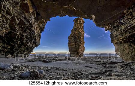Stock Photograph - Sea pillar known as Lot's Wife; South Shields, Tyne and Wear, England. Fotosearch
