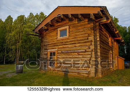 Slaven's Roadhouse, on a sunny, summer night with shadow of person waving, YukonCharley Rivers National Preserve; Yukon River, Alaska, United States of America View Large Photo Image Stock Photograph - Slaven's Roadhouse, on a sunny, summer night with shadow of person waving, YukonCharley Rivers National Preserve; Yukon River, Alaska, United States of America. Fotosearch