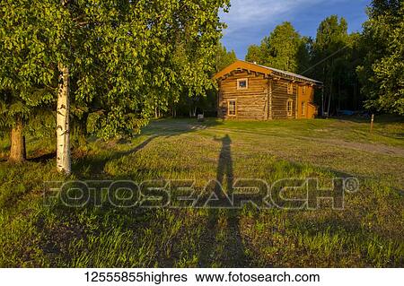 Slaven's Roadhouse on a sunny, summer evening with a shadow of a person waving, YukonCharley Rivers National Preserve; Alaska, United States of America View Large Photo Image Stock Photograph - Slaven's Roadhouse on a sunny, summer evening with a shadow of a person waving, YukonCharley Rivers National Preserve; Alaska, United States of America. Fotosearch