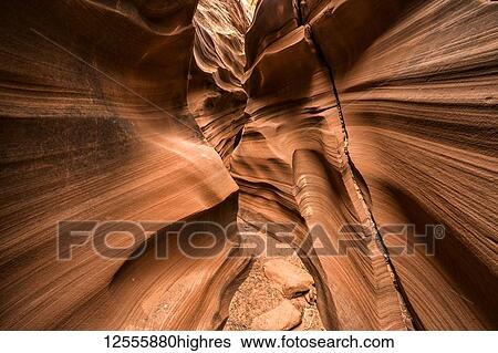 Stock Photograph - Slot Canyon known as Mountain Sheep Canyon; Page, Arizona, United States of America. Fotosearch
