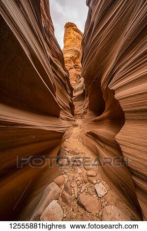Stock Photograph - Slot Canyon known as Mountain Sheep Canyon; Page, Arizona, United States of America. Fotosearch