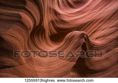 Stock Photograph - Slot Canyon known as Rattlesnake Canyon; Page, Arizona, United States of America. Fotosearch