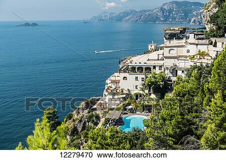 Some of the luxury resorts, pools and homes on the coastal drive of Amalfi, Italy at a high view in the mountains above the Mediterranean sea; Amalfi, Province of Salerno, Italy View Large Photo Image Stock Image - Some of the luxury resorts, pools and homes on the coastal drive of Amalfi, Italy at a high view in the mountains above the Mediterranean sea; Amalfi, Province of Salerno, Italy. Fotosearch