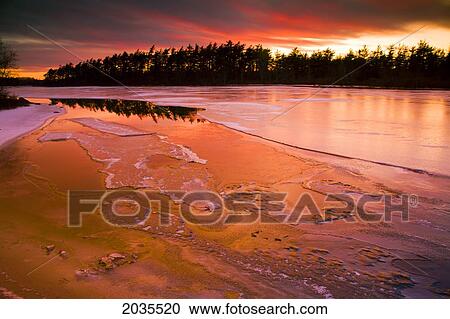 Spring Thaw Sunset, Rocky Lake, Nova Scotia View Large Photo Image Stock Image - Spring Thaw Sunset, Rocky Lake, Nova Scotia. Fotosearch