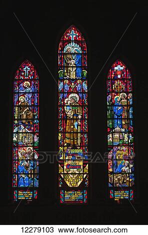 Stock Image - Stained glass windows of Saint-Michel Basilica-Cathedral; Sherbrooke, Quebec, Canada. Fotosearch