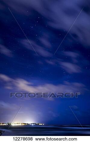 Stock Photo - Stars over the city of Kapaa as seen from Wailua; Wailua, Kauai, Hawaii, United States of America. Fotosearch
